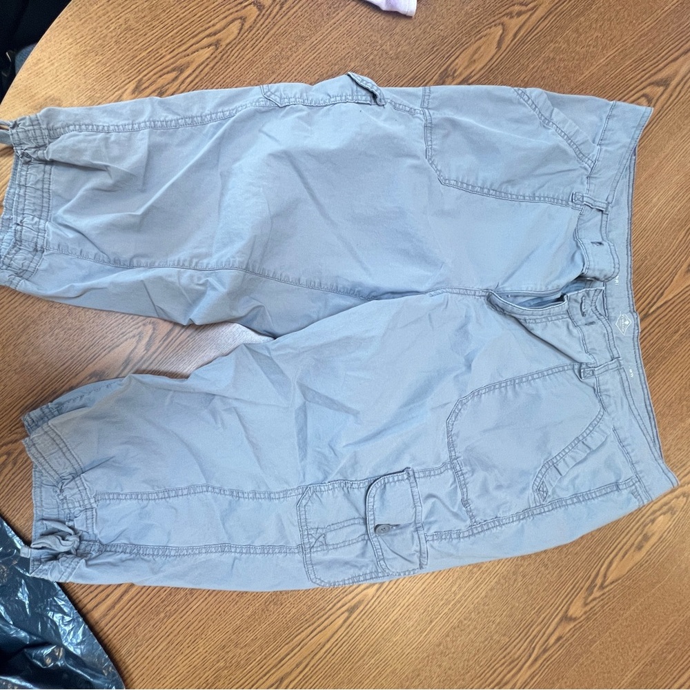 Gray capris.